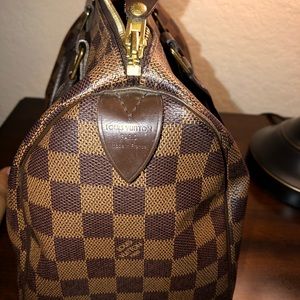 Louis Vuitton speedy bag.
